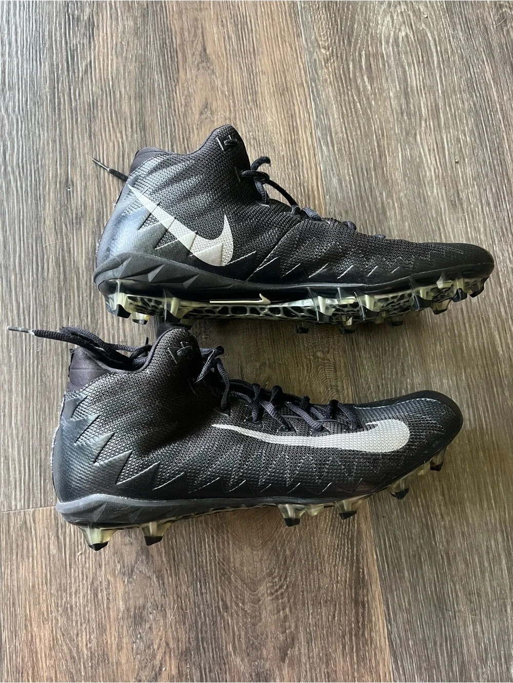 Nike Menace Men’s Black Cleats with White Swoosh